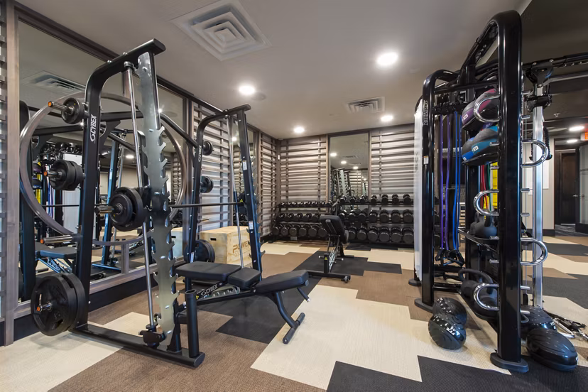 State-of-the-art fitness center with modern equipment at Ellison Heights Apartments, ideal for a luxury workout experience