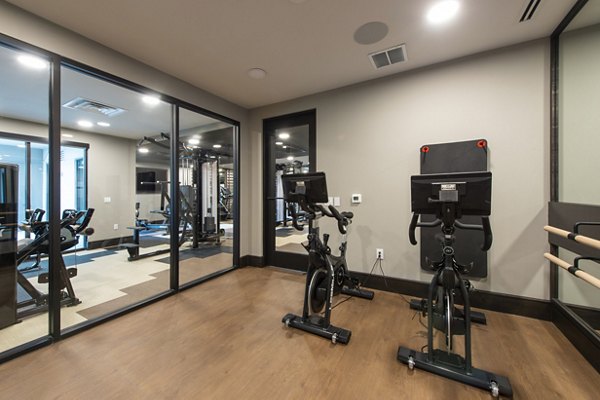 Yoga/spin studio with modern equipment at Ellison Heights Apartments
