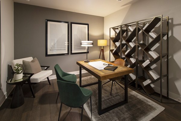 Modern kitchen with stainless steel appliances in Ellison Heights Apartments
