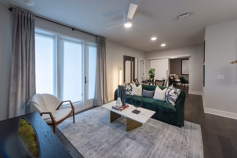 Elegant living room with modern decor at Ellison Heights Apartments