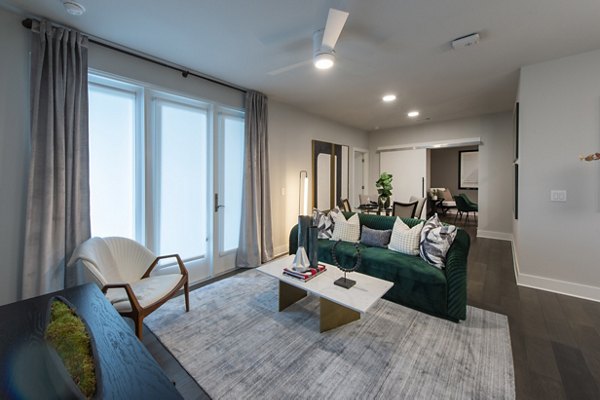 Elegant living room with modern decor at Ellison Heights Apartments