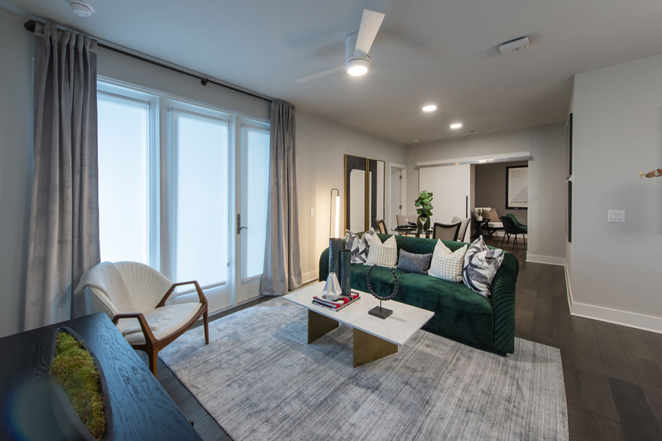 Elegant living room with modern decor at Ellison Heights Apartments
