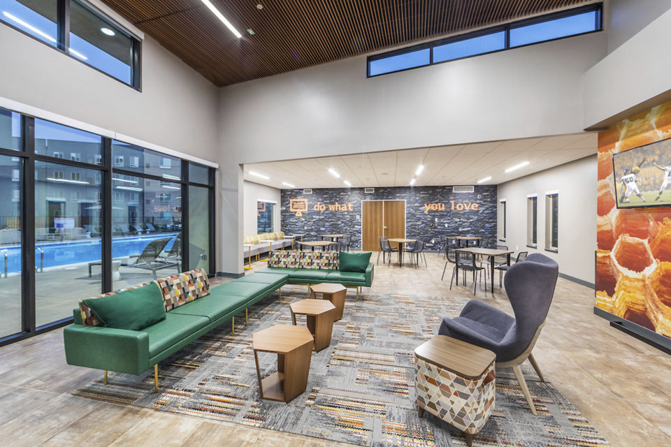 Luxurious clubhouse with modern dÃ©cor at Hornet Commons Apartments in Sacramento