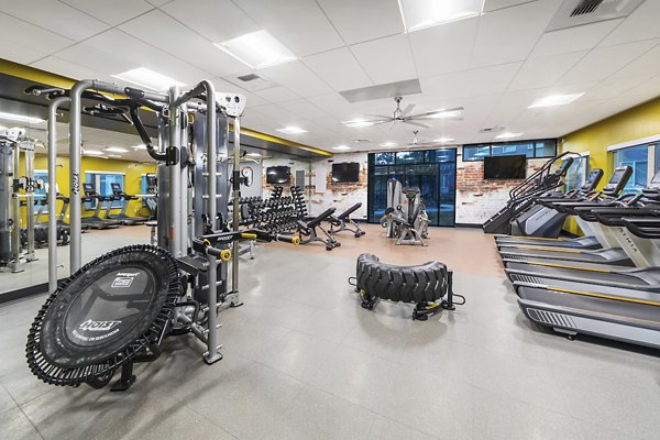 Fitness center with modern equipment at Hornet Commons Apartments