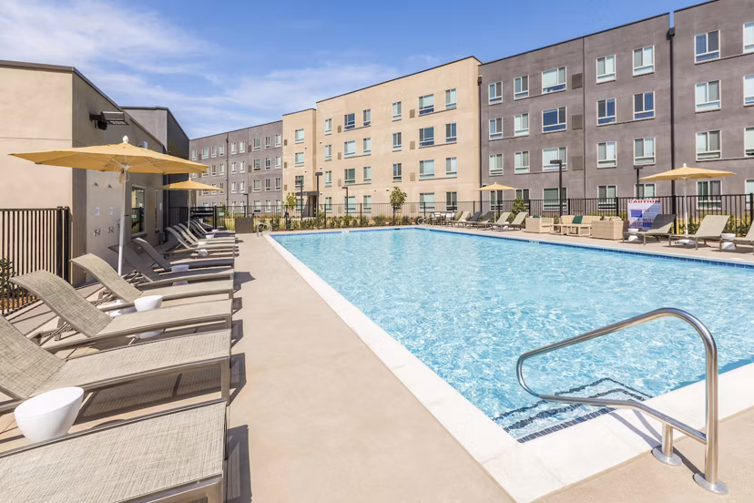 Resort-style pool at Hornet Commons Apartments offering leisure and relaxation in a modern setting