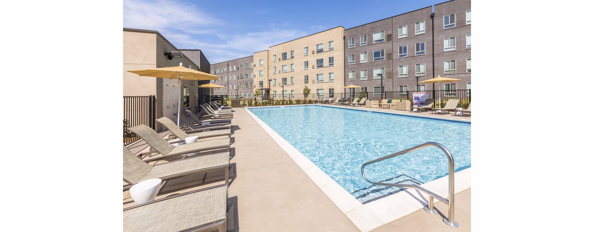 Resort-style pool at Hornet Commons Apartments offering leisure and relaxation in a modern setting