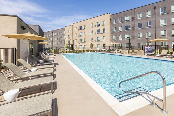 Resort-style pool at Hornet Commons Apartments offering leisure and relaxation in a modern setting