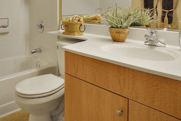 Bathroom with modern fixtures and sleek design at Museum Park Apartments, offering luxury living with convenient city access