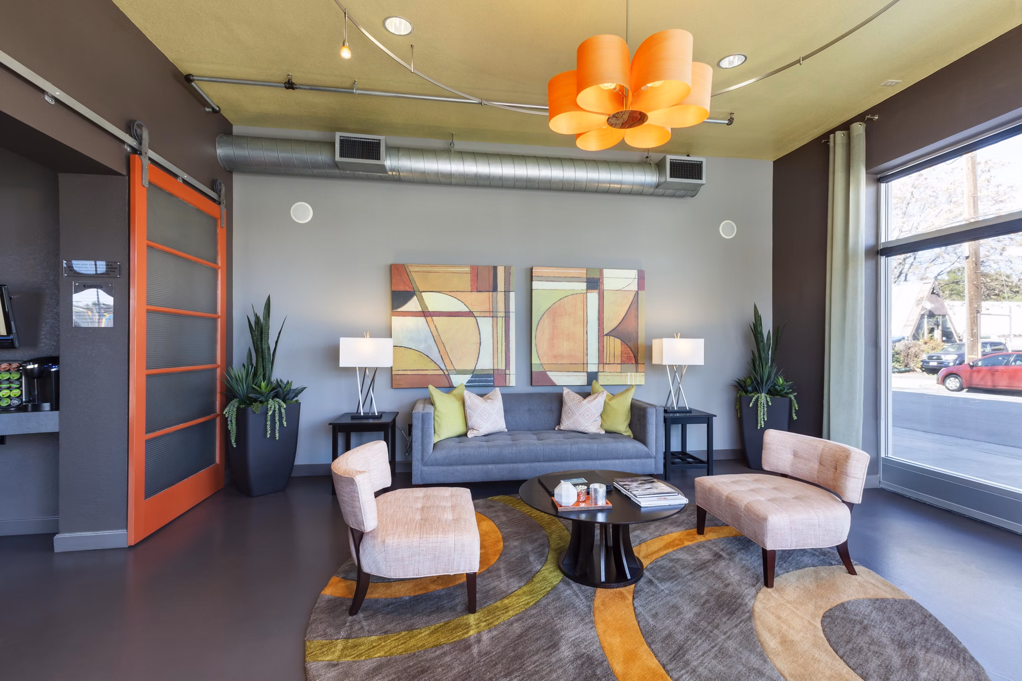 Clubhouse with modern design and comfortable seating at Museum Park Apartments Luxurious space for residents to relax and socialize