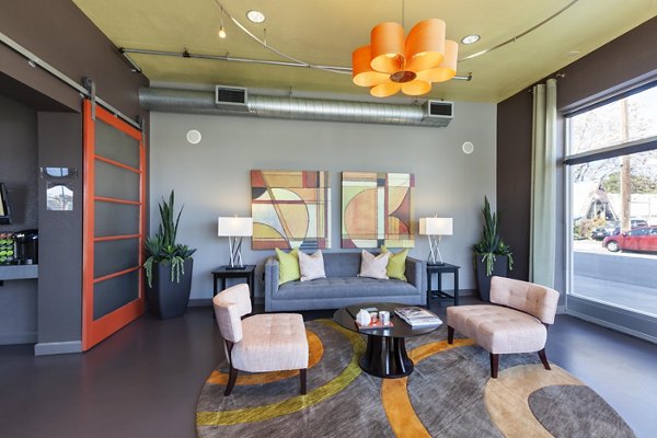 Clubhouse with modern design and comfortable seating at Museum Park Apartments Luxurious space for residents to relax and socialize