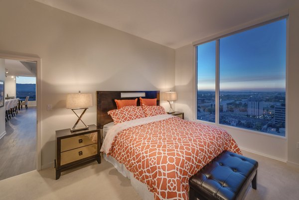 Modern bedroom with elegant dÃ©cor at One South Market Apartments