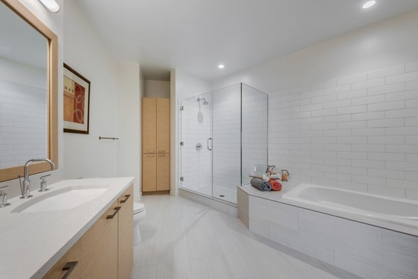 Luxury bathroom featuring modern fixtures at One South Market Apartments
