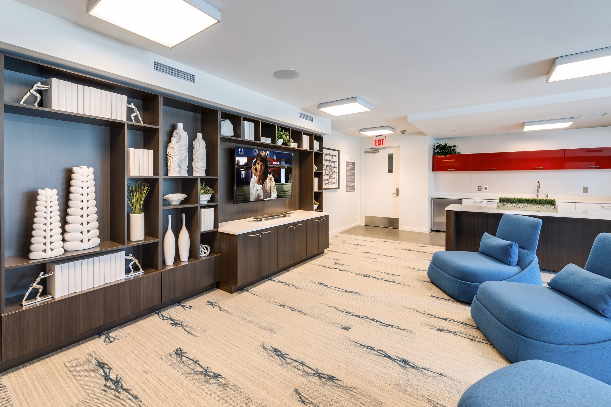 Modern clubhouse with stylish seating and open layout at One South Market Apartments: luxury living for a vibrant lifestyle downtown