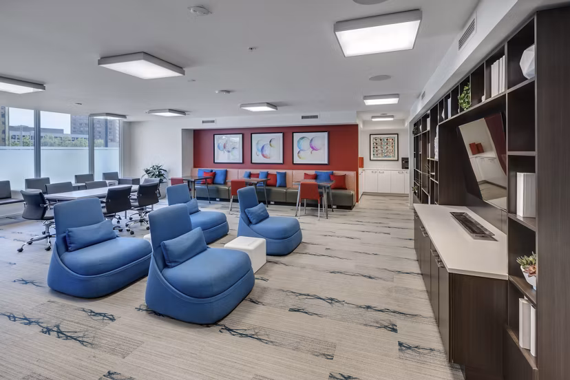 Clubhouse featuring modern seating and open spaces at One South Market Apartments