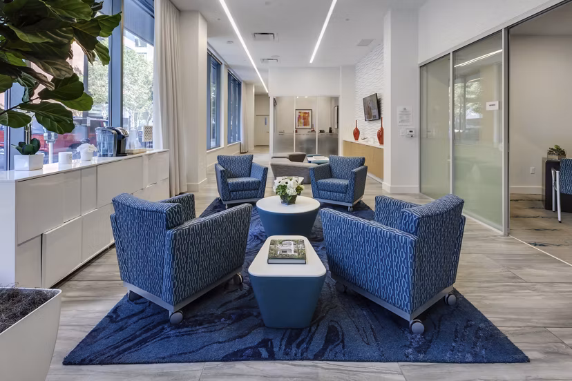 Elegant clubhouse with modern dÃ©cor at One South Market Apartments, perfect for social events and community gatherings
