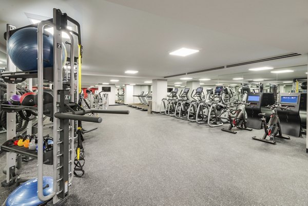 Fitness center with modern equipment at One South Market Apartments, ideal for residents seeking an active lifestyle in a luxury setting
