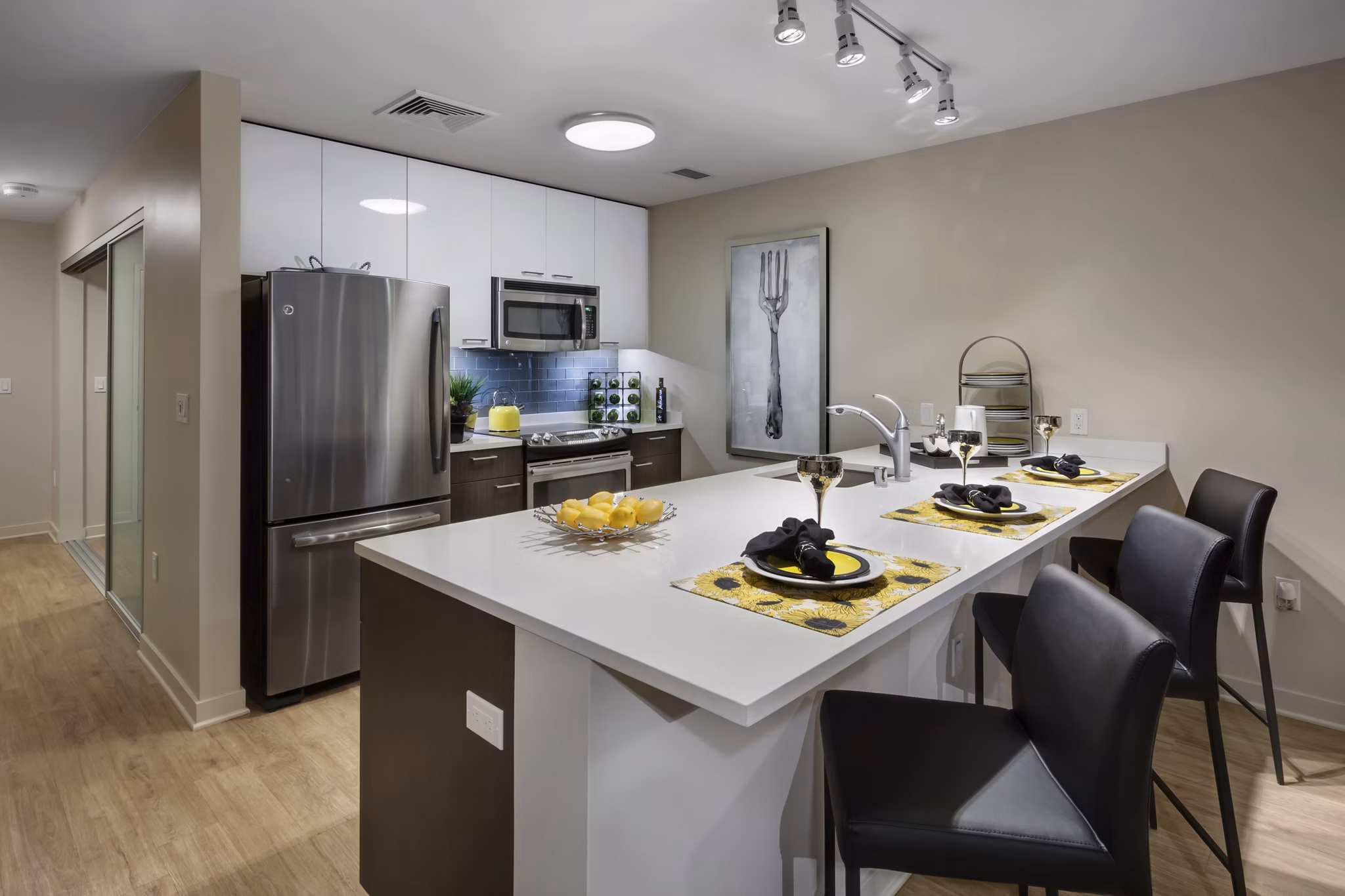 One South Market Apartments: Modern kitchen with stainless steel appliances and quartz countertops