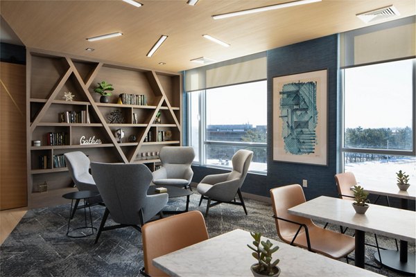 Caldwell Apartments: Modern clubhouse with elegant dÃ©cor and seating areas