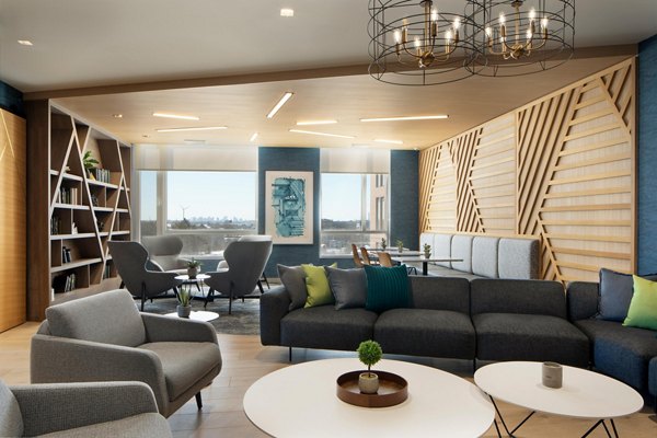 Clubhouse featuring modern design and cozy seating at Caldwell Apartments