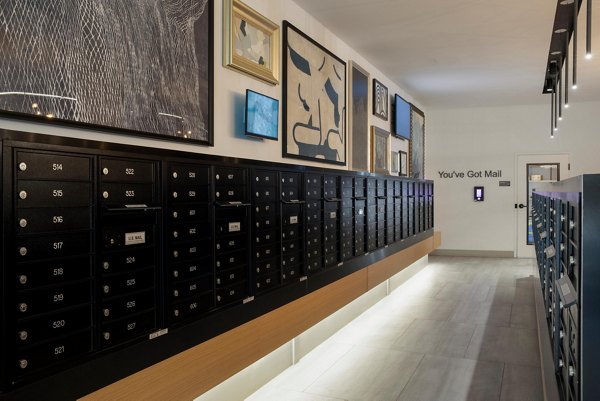 Efficient mail room with organized parcel lockers at Caldwell Apartments