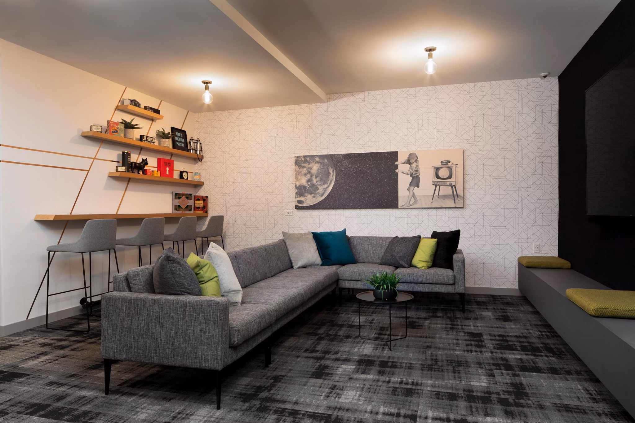 Caldwell Apartments: Modern business center with workstations and computers in clubhouse