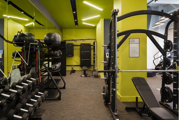 Modern fitness center with state-of-the-art equipment at Caldwell Apartments