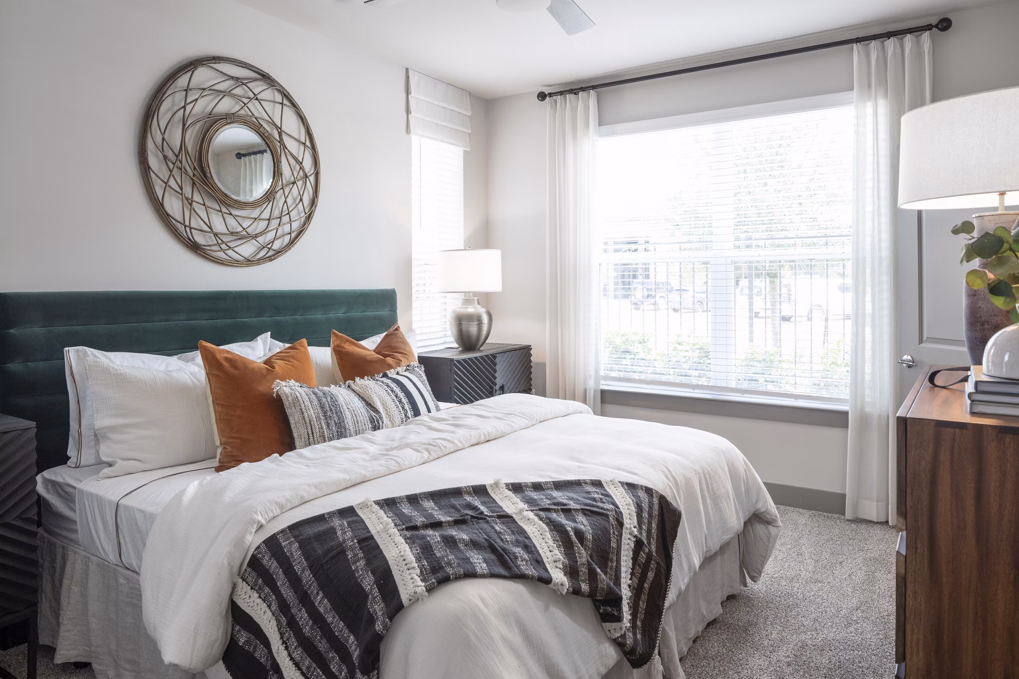 Bedroom featuring elegant decor and large windows at Broadstone Vintage Park Apartments