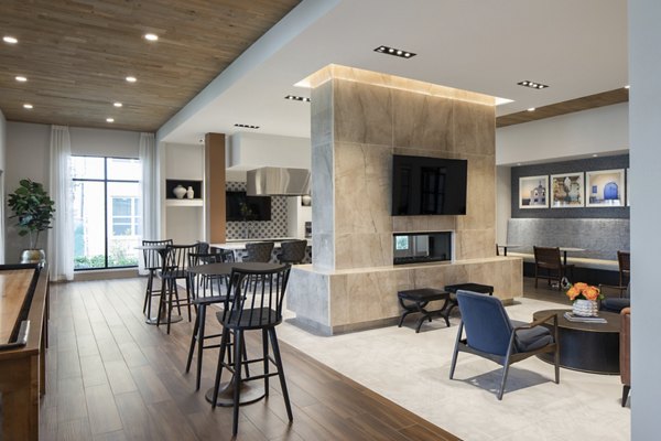 Clubhouse featuring modern design and spacious seating at Broadstone Vintage Park Apartments