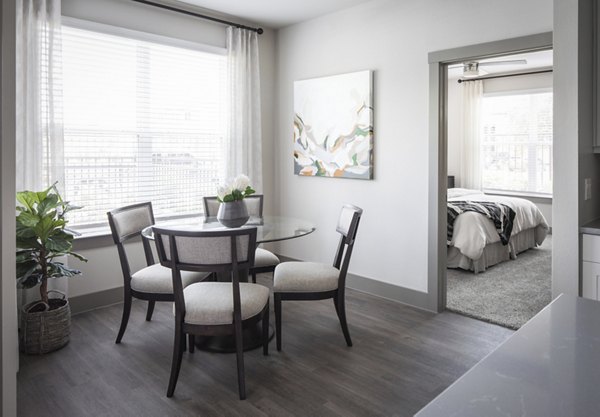 Dining area with modern decor and ample seating in Broadstone Vintage Park Apartments, ideal for entertaining and relaxation