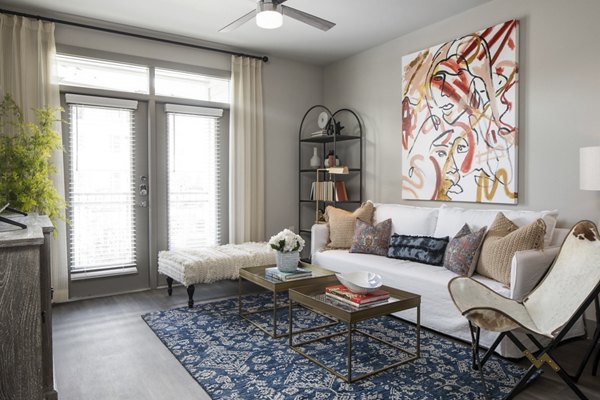 Elegant living room with plush seating and modern decor at Broadstone Vintage Park Apartments