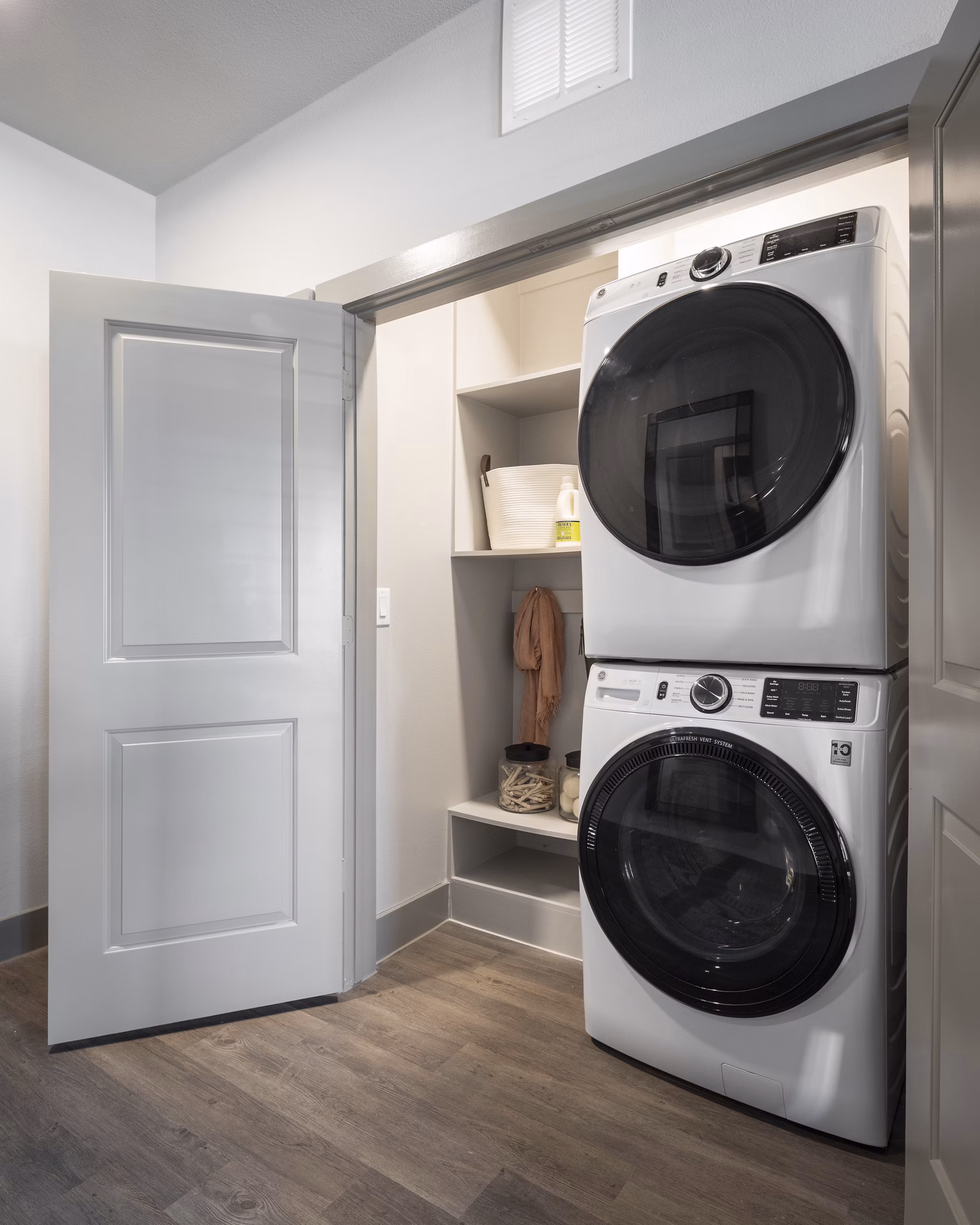 Laundry room with modern appliances at Broadstone Vintage Park Apartments