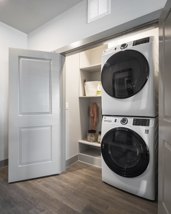 Laundry room with modern appliances at Broadstone Vintage Park Apartments