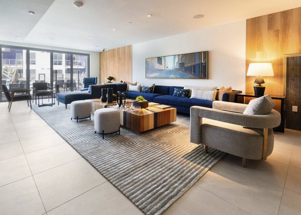 The Upper Ivy Apartments: Stylish clubhouse featuring modern design elements and lounge seating
