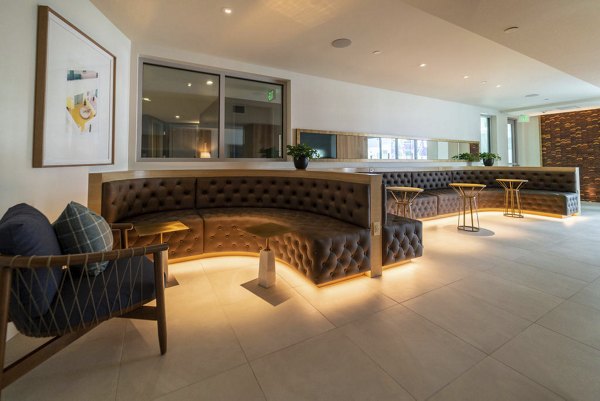 Clubhouse with modern design and luxurious seating at The Upper Ivy Apartments in Culver City