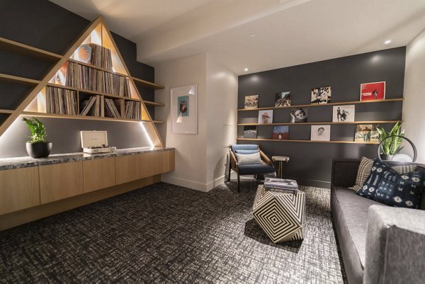 Clubhouse featuring modern design and cozy seating at The Upper Ivy Apartments in Culver City