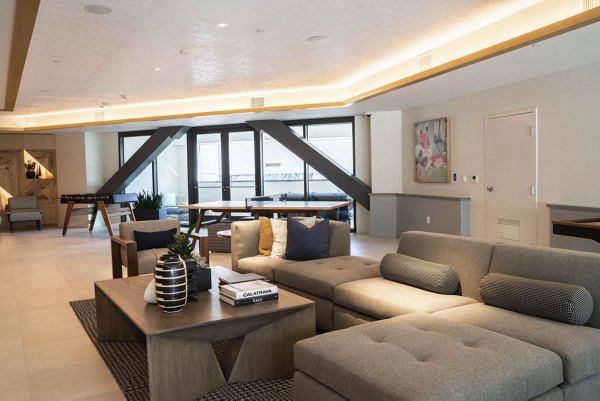 Clubhouse featuring modern decor and seating at The Upper Ivy Apartments in Culver City