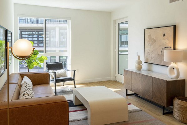 Spacious living room with modern decor at The Upper Ivy Apartments in Culver City, part of Greystar's luxury apartment portfolio