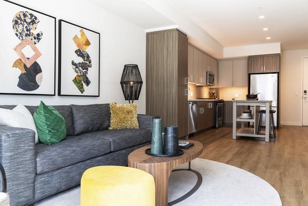 The Upper Ivy Apartments: Elegant living room with plush seating and modern decor options