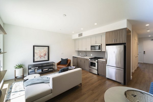 Spacious living room with modern furnishings at The Upper Ivy Apartments in Culver City