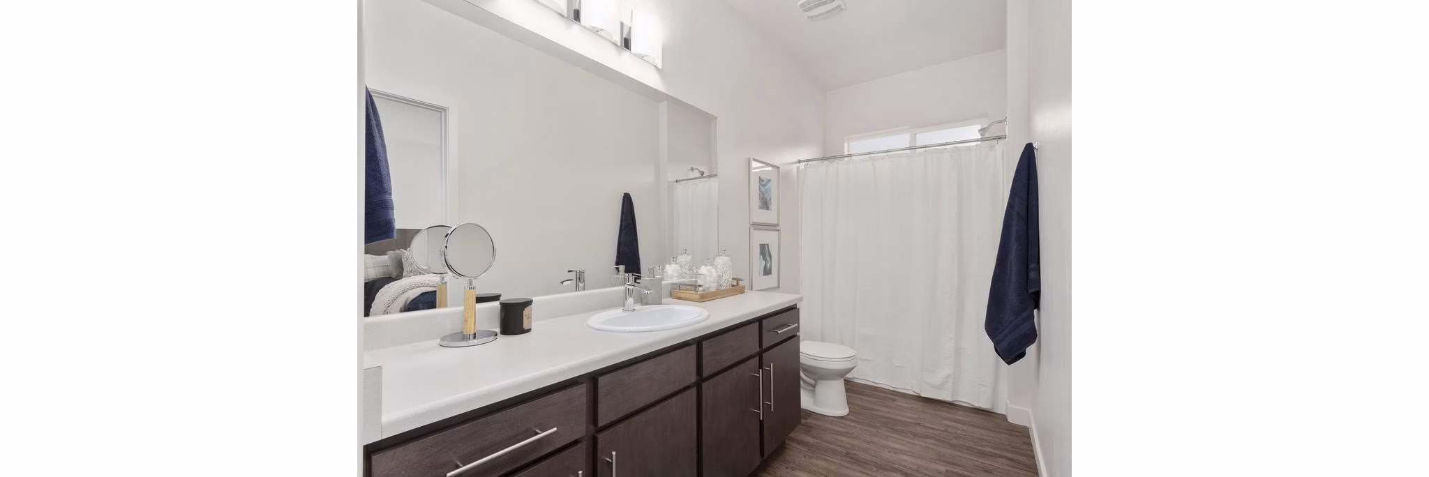 Modern bathroom with sleek fixtures at Haven Dell Apartments, offering luxury living in a sophisticated setting