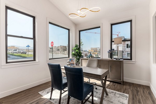 Modern clubhouse with stylish seating and pool table at Haven Dell Apartments