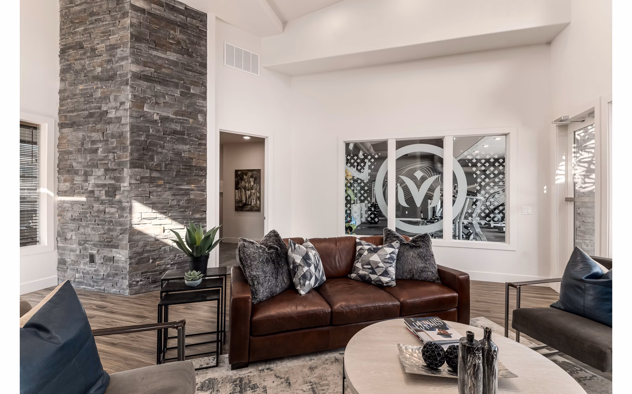 Clubhouse with modern seating and entertainment options at Haven Dell Apartments
