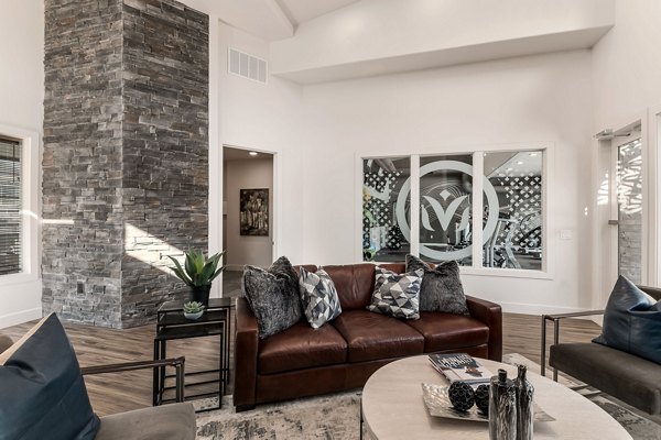 Clubhouse with modern seating and entertainment options at Haven Dell Apartments