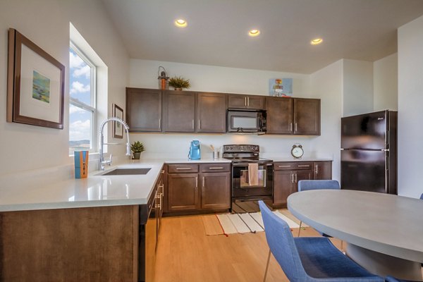 Elegant dining area with modern furnishings at Haven Dell Apartments