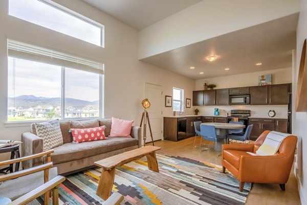 Modern living room with plush seating and natural light at Haven Dell Apartments