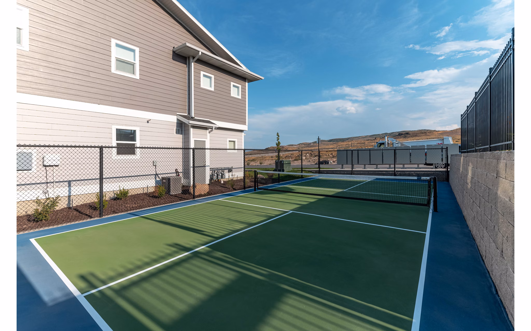 Sport court for basketball and tennis at Haven Dell Apartments
