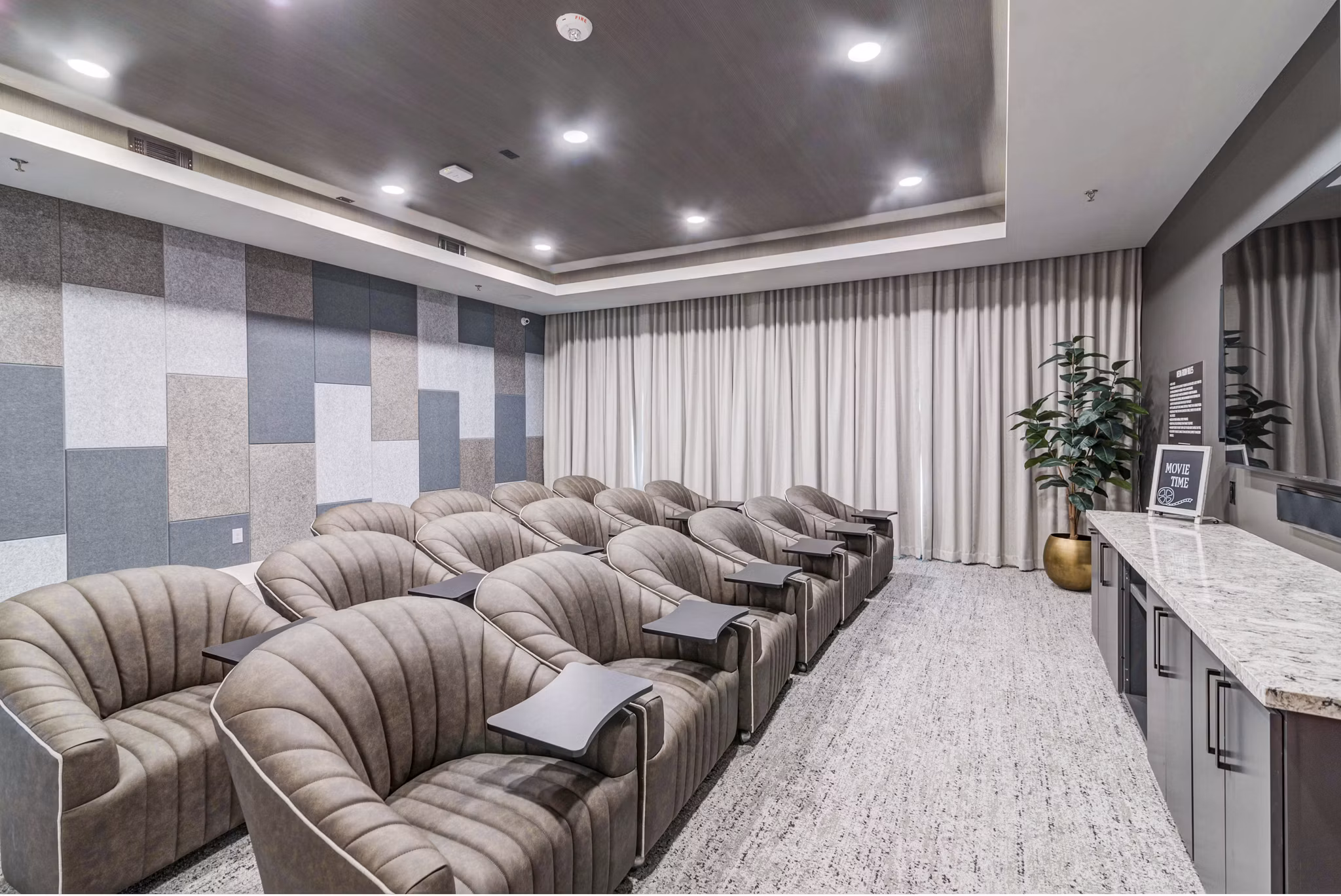 State-of-the-art theater room at Album Benbrook Apartments offering luxurious entertainment experience