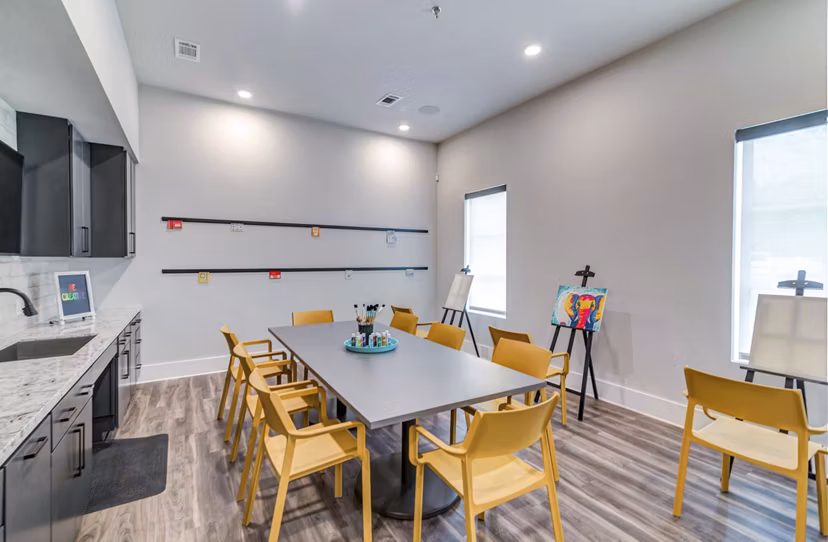 Art room with creative setup at Album Benbrook Apartments clubhouse, ideal for luxury living and leisure activities