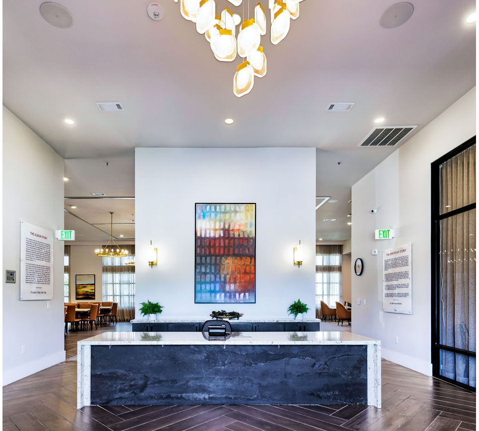 Modern clubhouse with stylish seating at Album Benbrook Apartments featuring luxury amenities and community spaces for social gatherings