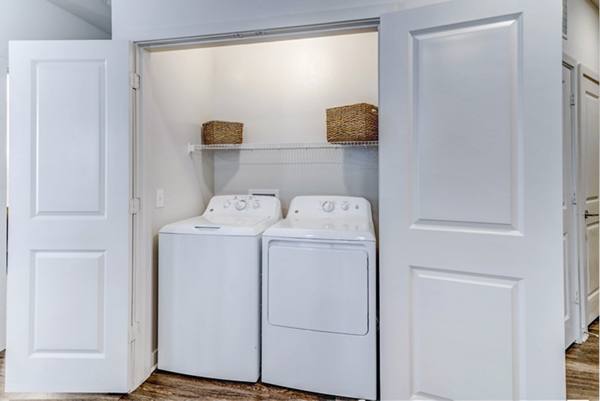 laundry room at Album Benbrook Apartments